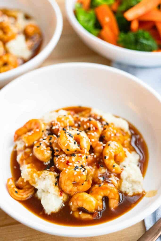 This is a picture of teriyaki shrimp with horseradish mashed cauliflower.