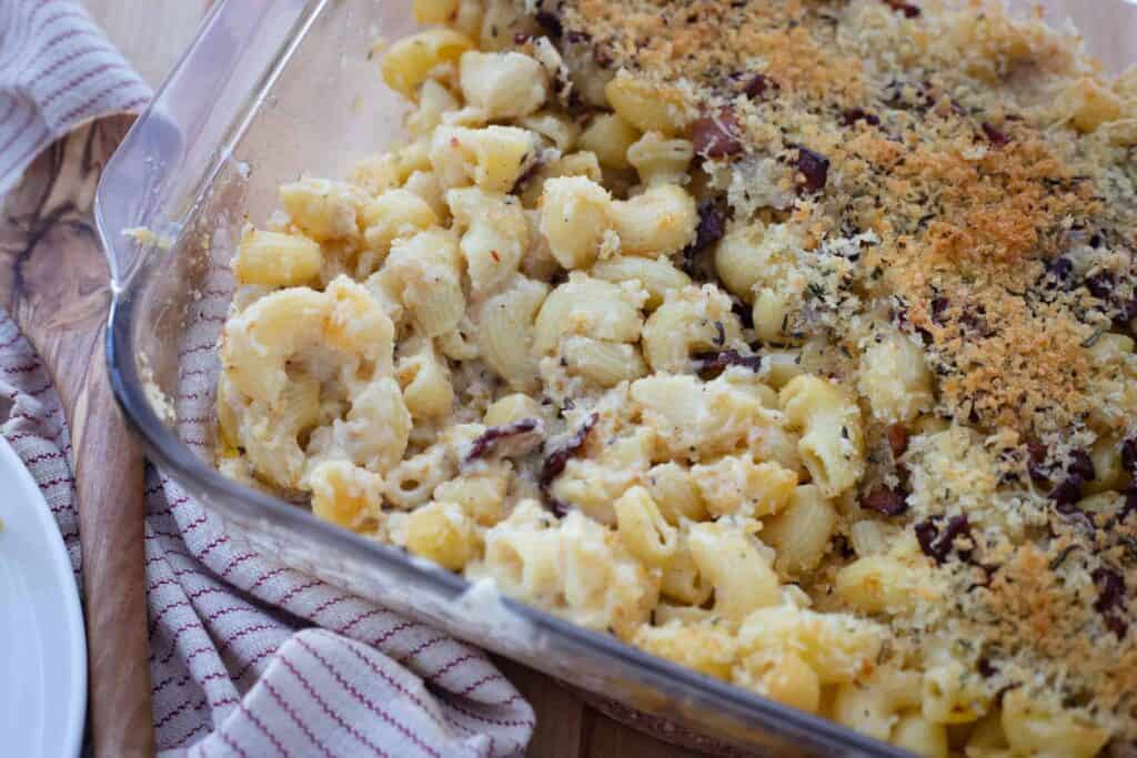 This is a picture of grown-up baked macaroni and cheese in a casserole dish.