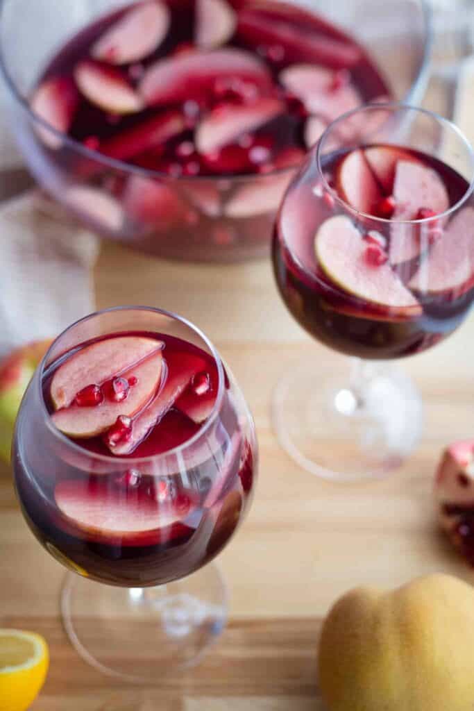 This is a picture of holiday party sangria in glasses.