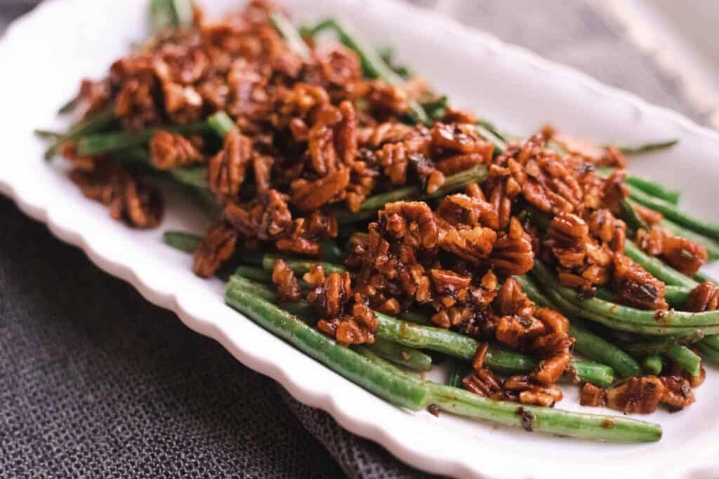 This is a picture of candied pecan green beans up close. 