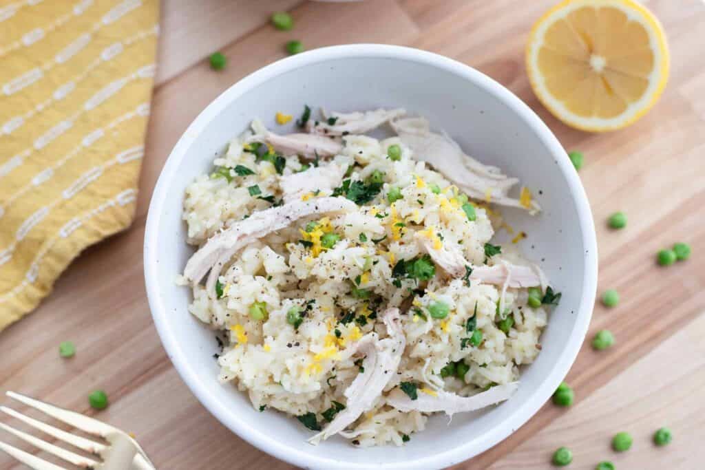 This is a picture of instant pot lemon pepper rice with rotisserie chicken.