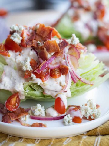 This is a picture of a classic wedge salad on a plate. The Hangry Economist.