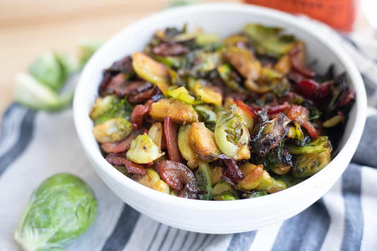 Maple bourbon brussels sprouts in a serving bowl.