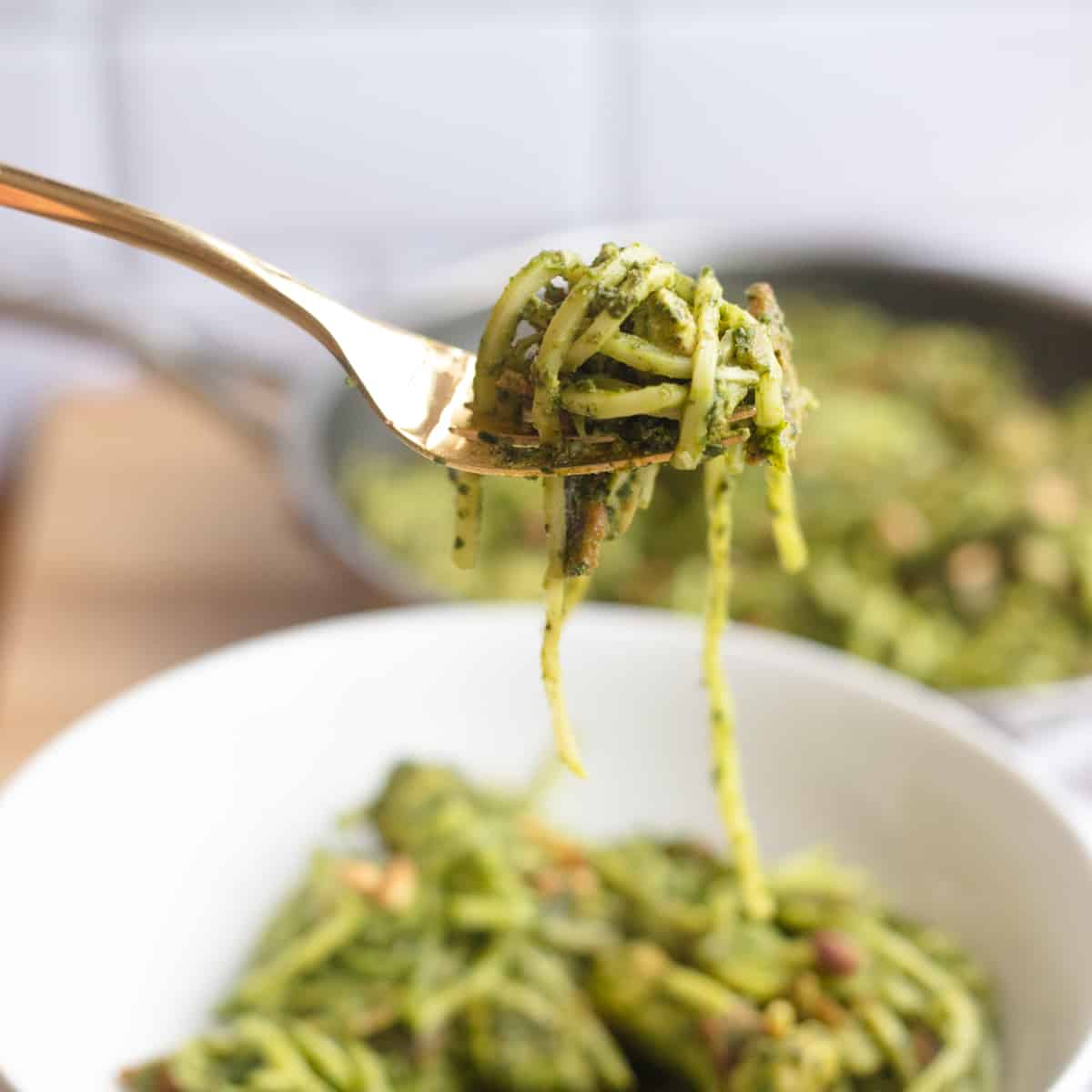 Hearts of palm pesto pasta on a fork. 