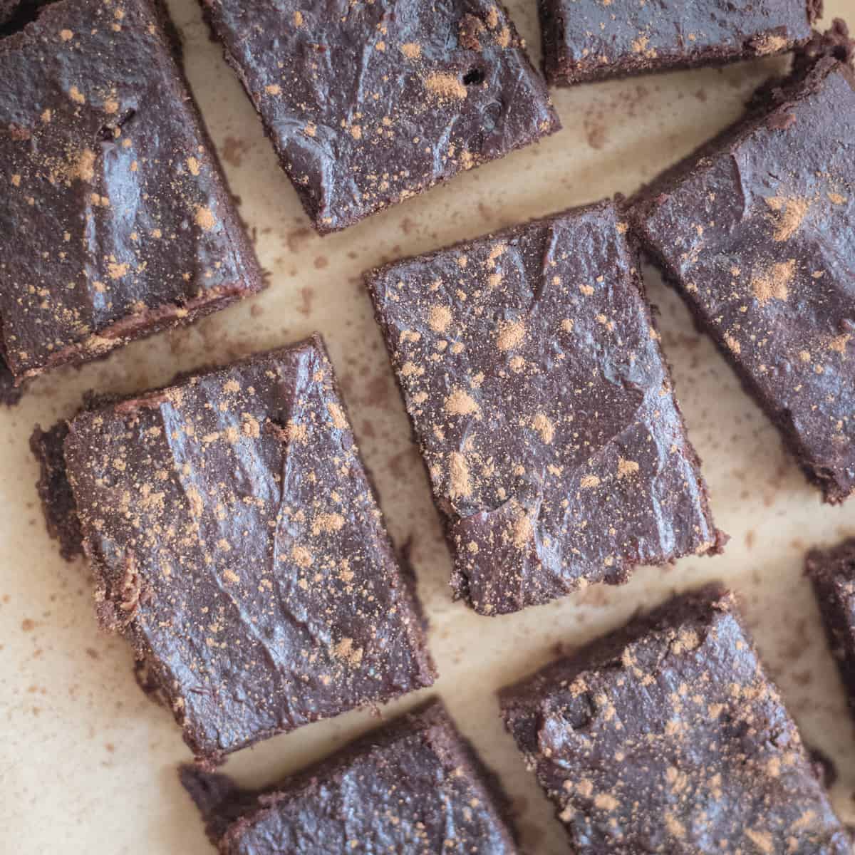 Date brownies on a sheet of parchment paper. 