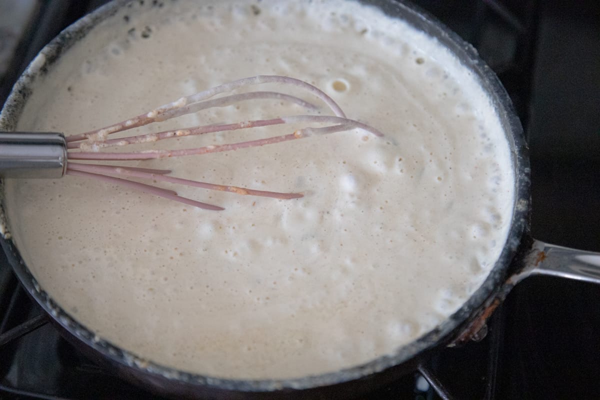 Bubbly cream in a pan. 