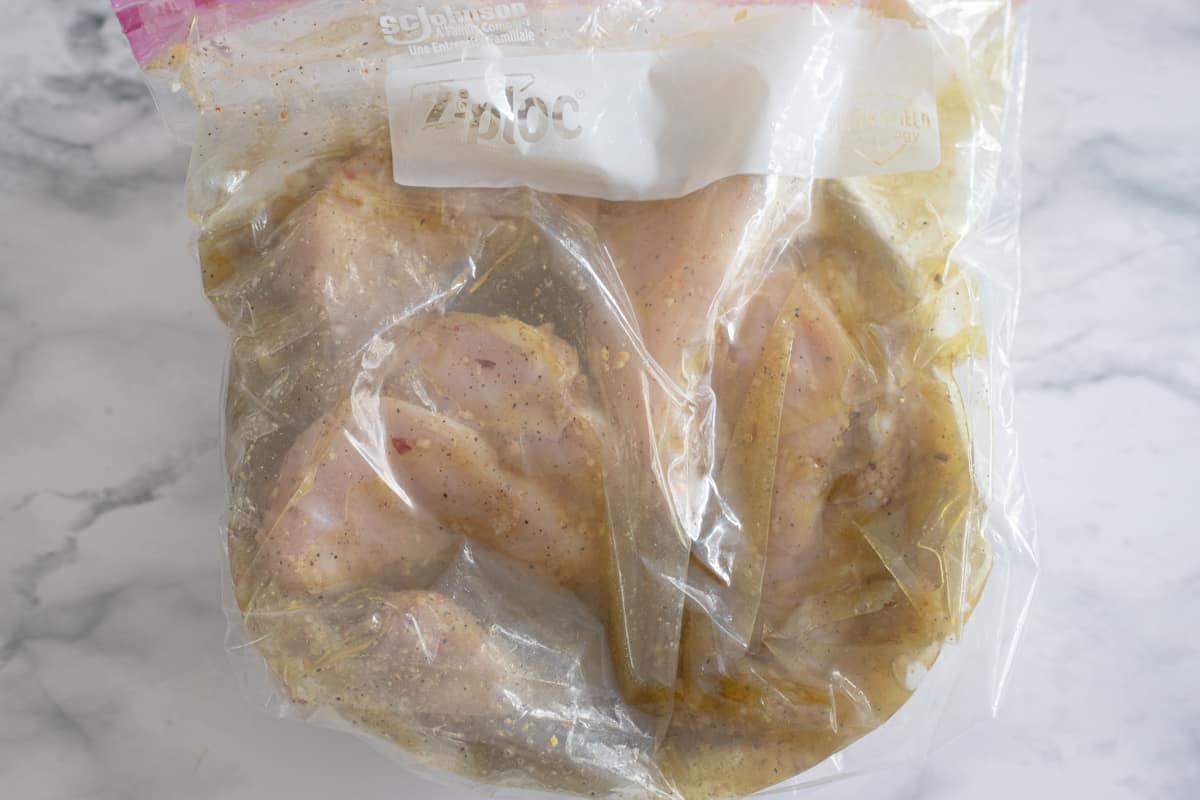 Chicken breasts in a baggie with marinade. 