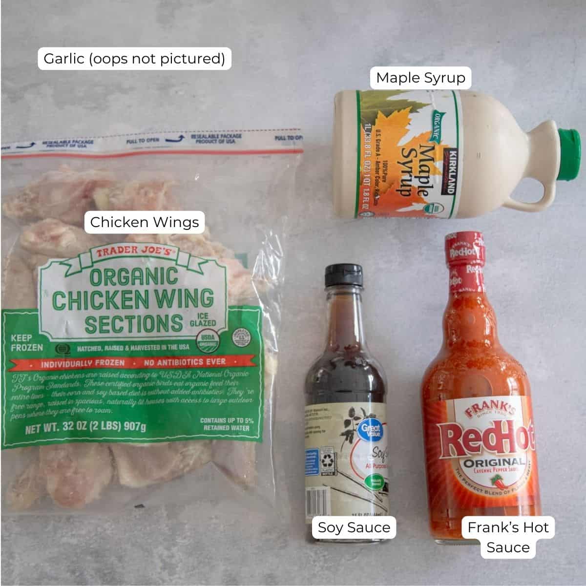 Ingredients for marinated chicken wings on a countertop. 