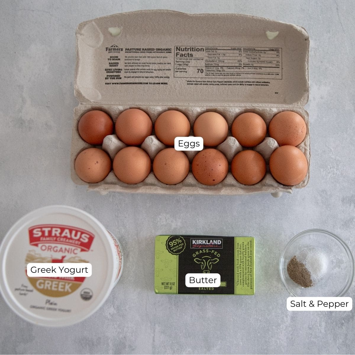 Ingredients for greek yogurt scrambled eggs on a countertop. 