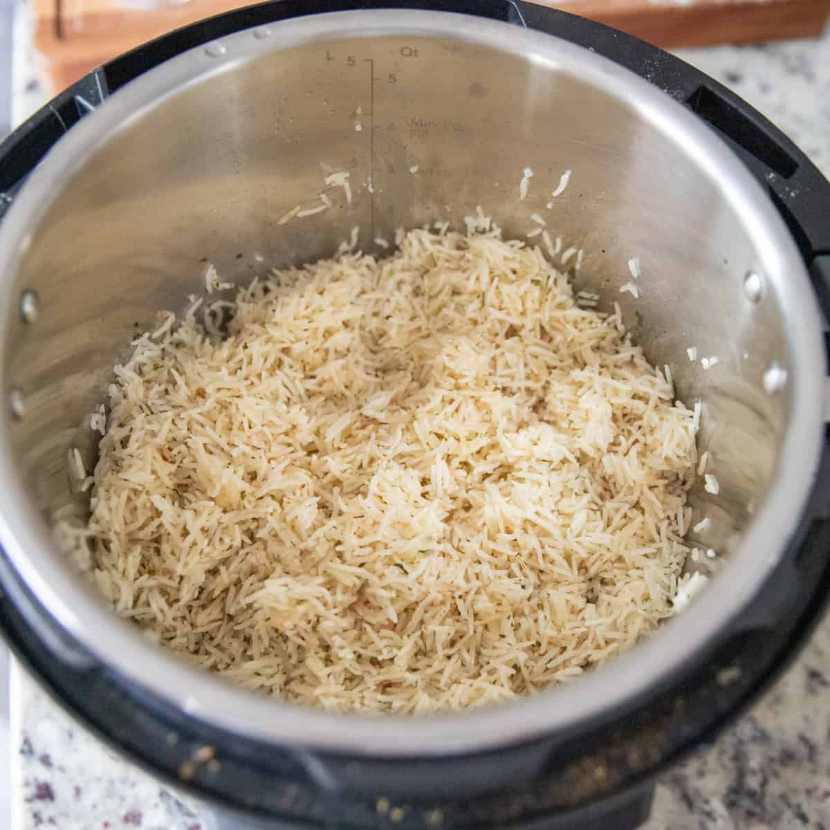 Fluffed, cooked rice in an instant pot.