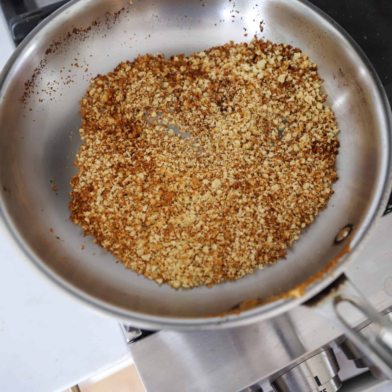 Toasted panko breadcrumbs in a pan.